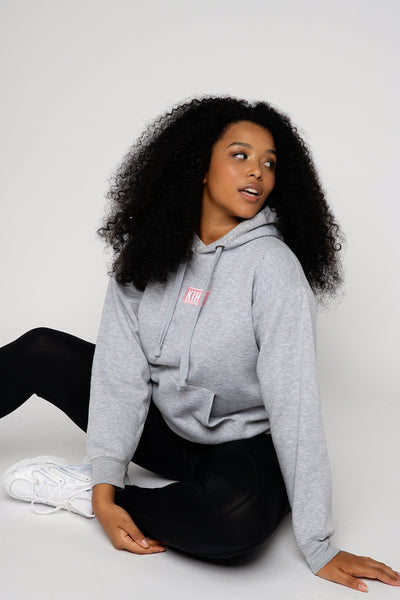 Light Grey Marl slightly oversized drop shoulder unisex hoodie with Kiht logo embroidered patch on the front in pink and white. Super soft thick fabric with chunky cord detail and hidder inner pockets make this our ultimate hoodie. Front
