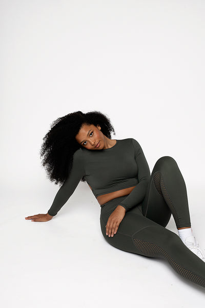UK ethical activewear Long sleeve gym crop top in green jungle khaki colour with punched panel back detailing